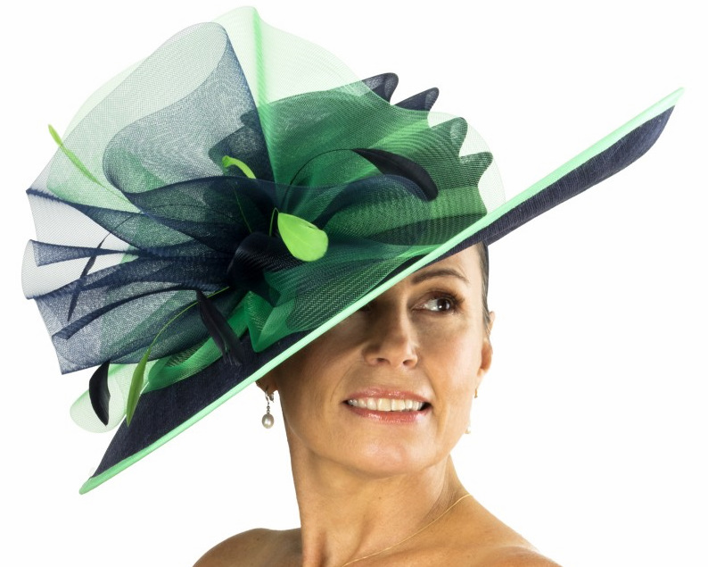 Elegant woman wearing a Blue and Green fascinator, ideal for derby and special occasions