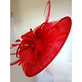 Red fascinator with large brim, flower and feathers