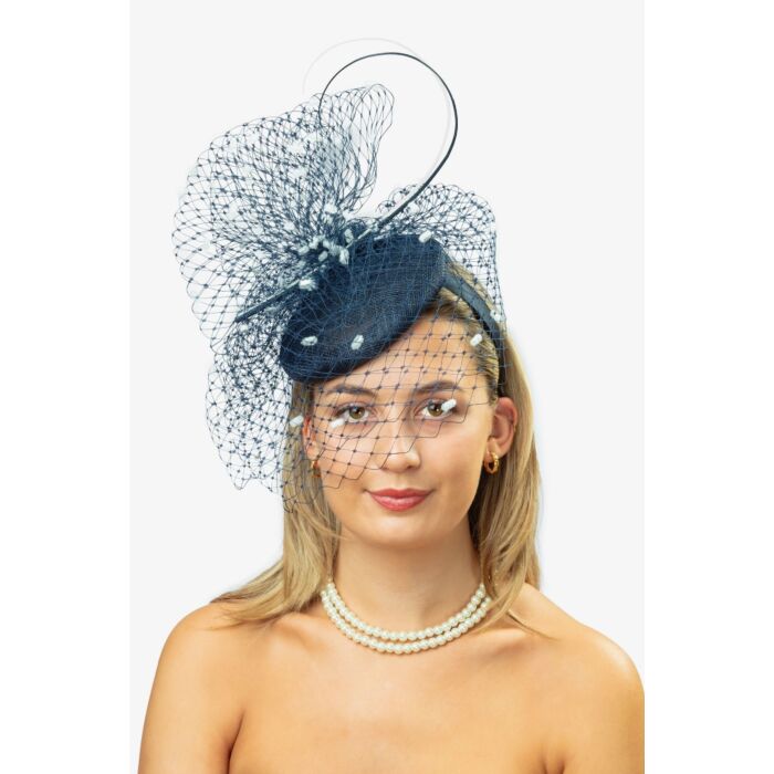 Navy blue fascinator with veiling and quills 