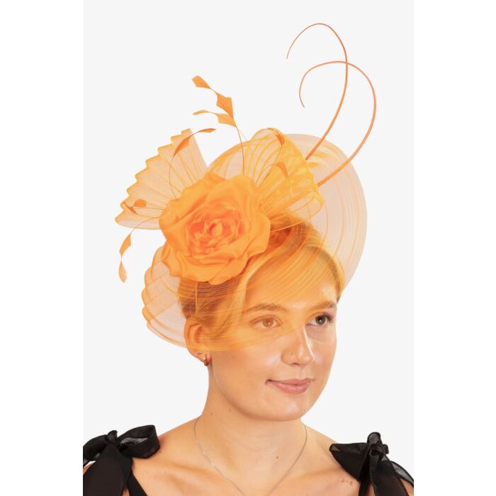 Orange crin fascinator, with a rose, fine feathers and quills