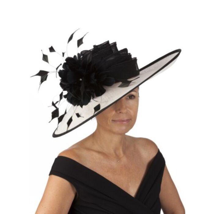 Black and white fascinator with tiers and plume