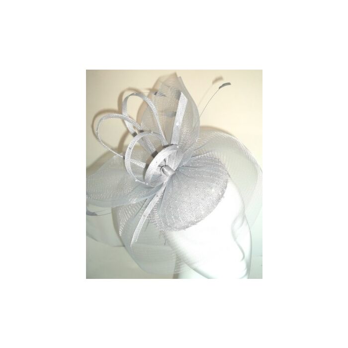 White pill box fascinator covered in sparkling beading