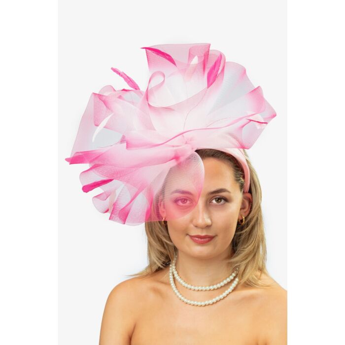 Large crin waves fascinator with pink sprayed edge 