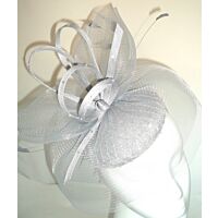White pill box fascinator covered in sparkling beading