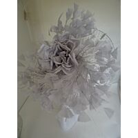 Silver fascinator on a veiling disc