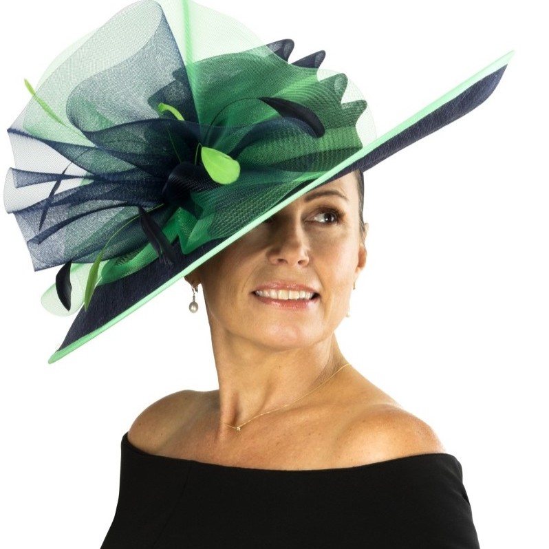 Elegant woman wearing a Blue and Green fascinator, ideal for derby and special occasions